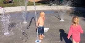 Children playing in splash pad